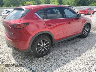 2018 Mazda CX-5 Grand Touring с VIN JM3KFBDM1J0332117, выставлен на аукционе Copart как лот 59379085 с пробегом 95 527 миль миль и Списание • Salvage title. История ставок и продаж доступна на DreamBid. Изображение 3.