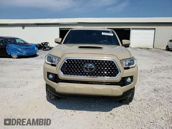 2019 Toyota Tacoma SR z VIN 3TMCZ5AN1KM285074, wystawiony jako Copart lot #53545975 z przebiegiem 53 838 mil mil oraz Szkoda całkowita • Salvage title. Historia ofert i sprzedaży dostępna na DreamBid. Obrazek 14.