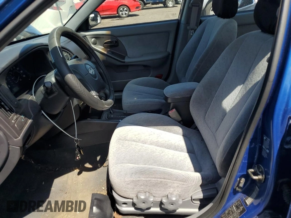2005 Hyundai Elantra GLS z VIN KMHDN46D15U063723, wystawiony jako Copart lot #56113495 z przebiegiem 115 513 mil mil oraz Szkoda całkowita • Salvage title. Historia ofert i sprzedaży dostępna na DreamBid. Obrazek 7.
