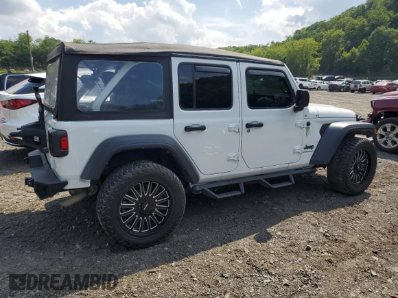 2023 Jeep Wrangler Sport with VIN 1C4HJXDGXPW596127, listed as a Copart auction lot 65395655 with 64,257 mi miles and Salvage title. Bid and sale history available at DreamBid. Image 3.