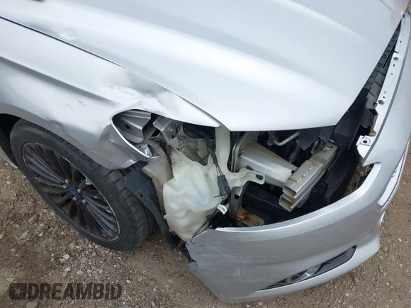 2014 Ford Fusion Titanium with VIN 3FA6P0K95ER151625, listed as a IAAI auction lot 42109141 with 182,328 mi miles and . Bid and sale history available at DreamBid. Image 6.