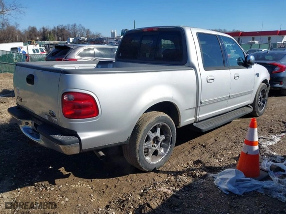 2002 Ford F-150 XLT with VIN 1FTRW07L42KA48341, listed as a IAAI auction lot 41433160 with 244,755 mi miles. Bid and sale history available at carsss.com. Image 4.