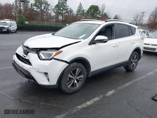 2017 Toyota RAV4 XLE with VIN JTMRFREV6HJ716907, listed as a IAAI auction lot 41056444 with 118,335 mi miles. Bid and sale history available at carsss.com. Image 17.