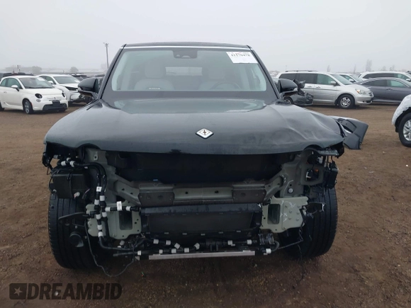 2024 Rivian R1S Adventure with VIN 7PDSGABA1RN035557, listed as a IAAI auction lot 41170478 with 5,210 mi miles. Bid and sale history available at carsss.com. Image 13.