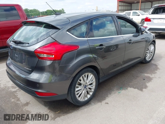 2018 Ford Focus Titanium with VIN 1FADP3N28JL323825, listed as a IAAI auction lot 42341286 with 46,565 mi miles and . Bid and sale history available at DreamBid. Image 4.