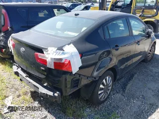 2013 Kia Rio LX with VIN KNADM4A30D6202570, listed as a IAAI auction lot 41215769 with Not Provided miles and . Bid and sale history available at DreamBid. Image 4.