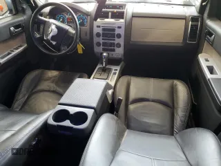 2010 Mercury Mariner Premier z VIN 4M2CN9HG8AKJ09441, wystawiony jako Copart lot #60267415 z przebiegiem 152 908 mil mil oraz Nie do naprawy • Non repairable. Historia ofert i sprzedaży dostępna na DreamBid. Obrazek 8.