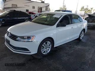 2015 Volkswagen Jetta Sedan 2.0L S with VIN 3VW2K7AJ3FM253125, listed as a IAAI auction lot 41535632 with 103,953 mi miles. Bid and sale history available at carsss.com. Image 17.