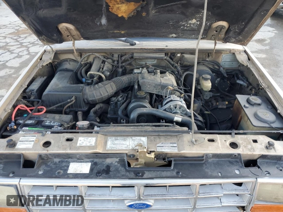 1989 Ford Ranger XL with VIN 1FTCR10AXKUC35082, listed as a Copart auction lot 42209825 with 754,095 mi miles and Salvage title. Bid and sale history available at DreamBid. Image 11.