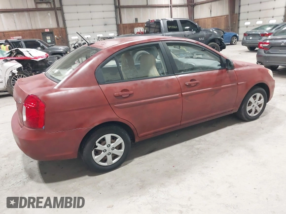 2009 Hyundai Accent Auto GLS with VIN KMHCN46C89U306436, listed as a IAAI auction lot 42010992 with 70,998 mi miles. Bid and sale history available at carsss.com. Image 4.