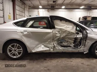 2018 Ford Fusion SE with VIN 3FA6P0HD1JR243112, listed as a IAAI auction lot 42256676 with 112,003 mi miles and . Bid and sale history available at DreamBid. Image 6.