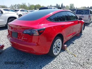 2021 Tesla Model 3 Long Range with VIN 5YJ3E1EB6MF054361, listed as a IAAI auction lot 42105247 with 58,986 mi miles and . Bid and sale history available at carsss.com. Image 4.