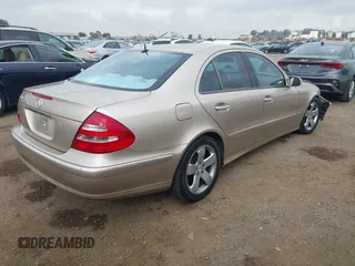 2005 Mercedes-Benz E-Class 3.2L with VIN WDBUF65J25A614469, listed as a IAAI auction lot 41521864 with 90,403 mi miles. Bid and sale history available at carsss.com. Image 4.