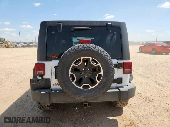 2012 Jeep Wrangler Unlimited Sport with VIN 1C4BJWDG9CL187421, listed as a Copart auction lot 61411145 with 140,390 mi miles and Clean title. Bid and sale history available at DreamBid. Image 6.