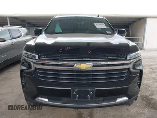 2021 Chevrolet Suburban LT z VIN 1GNSCCKDXMR421833, wystawiony jako IAAI lot #41738389 z przebiegiem 56 757 mil mil oraz . Historia ofert i sprzedaży dostępna na DreamBid. Obrazek 12.