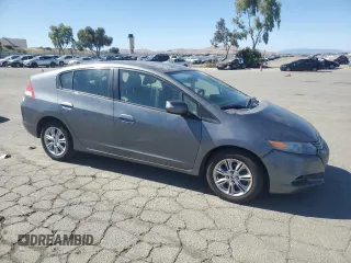 2011 Honda Insight EX z VIN JHMZE2H71BS006434, wystawiony jako Copart lot #58045495 z przebiegiem 270 645 mil mil oraz Czysty tytuł • Clean title. Historia ofert i sprzedaży dostępna na DreamBid. Obrazek 4.