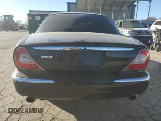 2005 Jaguar XJ VDP with VIN SAJWA82C75SG45094, listed as a Copart auction lot 83891564 with 57,467 mi miles and Salvage Title. Bid and sale history available at carsss.com. Image 6.