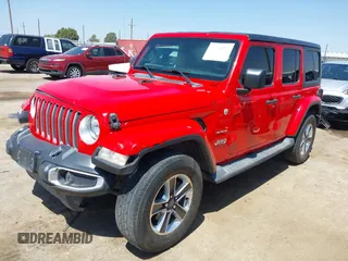 2019 Jeep Wrangler Unlimited Sahara with VIN 1C4HJXEN8KW591398, listed as a IAAI auction lot 42045071 with 87,410 mi miles and . Bid and sale history available at DreamBid. Image 18.