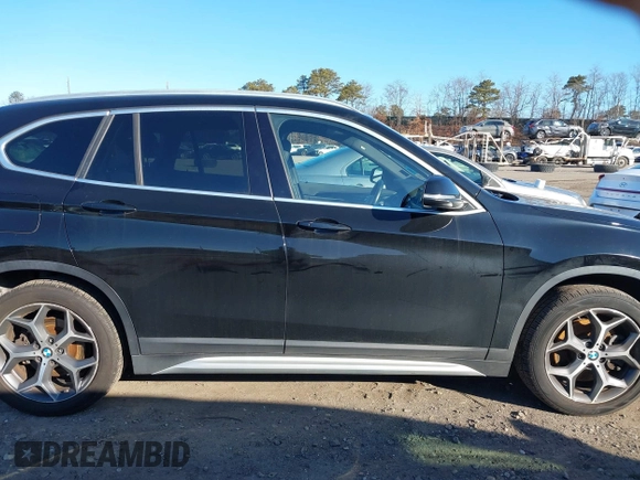 2018 BMW X1 xDrive28i with VIN WBXHT3C36J5L29746, listed as a IAAI auction lot 41547100 with 103,420 mi miles and . Bid and sale history available at DreamBid. Image 13.
