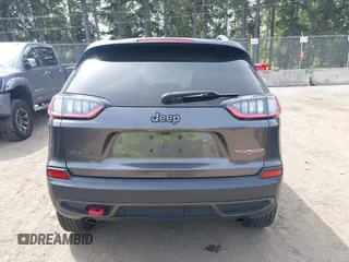 2019 Jeep Cherokee Trailhawk with VIN 1C4PJMBX2KD231734, listed as a IAAI auction lot 42235469 with 104,565 mi miles and . Bid and sale history available at DreamBid. Image 16.