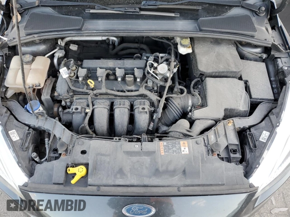 2017 Ford Focus SE z VIN 1FADP3F25HL331714, wystawiony jako Copart lot #77389764 z przebiegiem 49 953 mil mil oraz Szkoda całkowita • Salvage title. Historia ofert i sprzedaży dostępna na DreamBid. Obrazek 11.