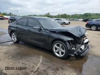2014 BMW 3 Series 320i xDrive with VIN WBA3C3G51ENS69364, listed as a Copart auction lot 58920115 with 117,209 mi miles and Salvage title. Bid and sale history available at DreamBid. Image 4.