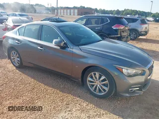 2015 Infiniti Q50 Premium z VIN JN1BV7AP3FM352914, wystawiony jako IAAI lot #42562802 z przebiegiem 149 684 mil mil oraz . Historia ofert i sprzedaży dostępna na DreamBid. Obrazek 1.