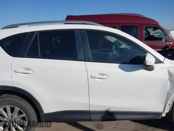 2015 Mazda CX-5 Sport with VIN JM3KE2BE3F0449722, listed as a IAAI auction lot 41825810 with 181,949 mi miles and . Bid and sale history available at DreamBid. Image 14.