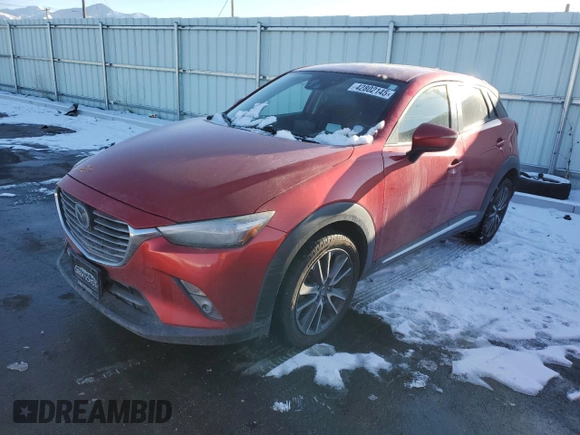 2016 Mazda CX-3 Grand Touring with VIN JM1DKBD78G0113185, listed as a Copart auction lot 42802145 with 158,068 mi miles and Salvage Title. Bid and sale history available at DreamBid. Image 1.