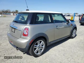 2011 MINI Hardtop with VIN WMWSU3C50BT182450, listed as a Copart auction lot 48638415 with 119,471 mi miles and Clean Title. Bid and sale history available at DreamBid. Image 3.