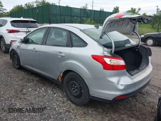 2012 Ford Focus SE with VIN 1FAHP3F29CL353872, listed as a IAAI auction lot 42528943 with Not provided miles and . Bid and sale history available at DreamBid. Image 3.