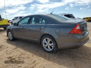 2012 Ford Fusion SE с VIN 3FAHP0HG7CR311306, выставлен на аукционе Copart как лот 55974355 с пробегом 74 299 миль миль и Чистый • Clean title. История ставок и продаж доступна на DreamBid. Изображение 2.