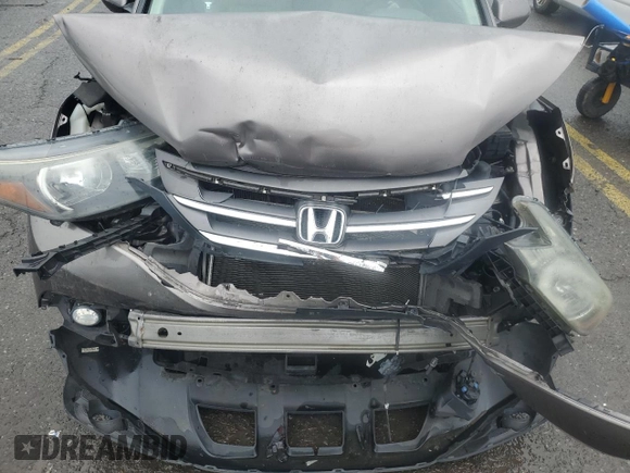 2014 Honda CR-V EX z VIN 5J6RM4H57EL085051, wystawiony jako Copart lot #56762055 z przebiegiem 125 956 mil mil oraz Szkody całkowita. Historia ofert i sprzedaży dostępna na DreamBid. Obrazek 11.