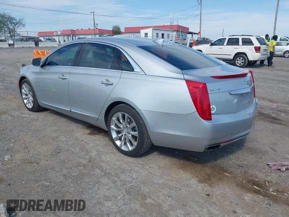 2016 Cadillac XTS Luxury Collection z VIN 2G61M5S33G9107107, wystawiony jako IAAI lot #42072608 z przebiegiem 130 542 mil mil oraz . Historia ofert i sprzedaży dostępna na DreamBid. Obrazek 3.