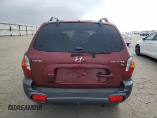 2002 Hyundai Santa Fe GLS with VIN KM8SC13D02U173092, listed as a Copart auction lot 87683115 with 96,950 mi miles and Salvage Title. Bid and sale history available at carsss.com. Image 6.
