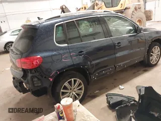 2016 Volkswagen Tiguan S with VIN WVGBV7AX6GW029794, listed as a IAAI auction lot 41698112 with 73,084 mi miles and . Bid and sale history available at DreamBid. Image 4.