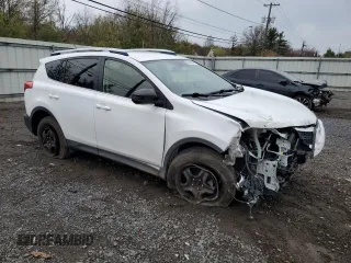 2014 Toyota RAV4 LE with VIN JTMBFREV9ED079488, listed as a Copart auction lot 52695515 with 106,097 mi miles and Salvage Title. Bid and sale history available at DreamBid. Image 4.