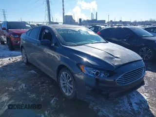 2020 Ford Fusion SE z VIN 3FA6P0LU6LR185721, wystawiony jako IAAI lot #41639827 z przebiegiem 63 857 mil mil oraz . Historia ofert i sprzedaży dostępna na DreamBid. Obrazek 17.