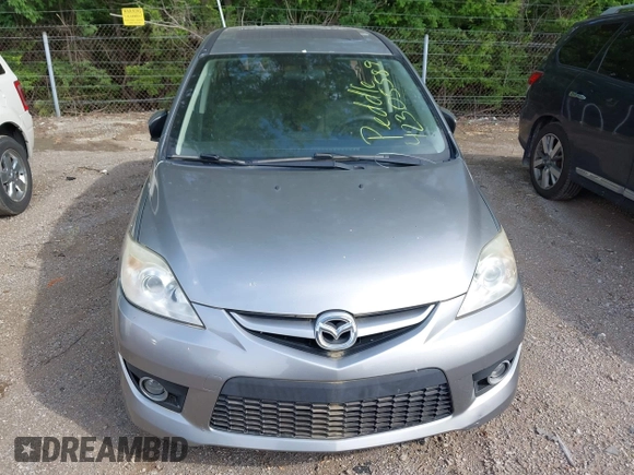 2010 Mazda 5 Sport with VIN JM1CR2W31A0384307, listed as a IAAI auction lot 42305589 with 144,372 mi miles and . Bid and sale history available at DreamBid. Image 6.
