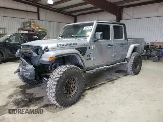 2021 Jeep Gladiator Freedom с VIN 1C6HJTAG2ML579159, выставлен на аукционе Copart как лот 42954605 с пробегом 66 865 миль миль и Списание • Salvage title. История ставок и продаж доступна на DreamBid. Изображение 1.