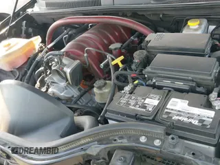 2009 Jeep Grand Cherokee with VIN 1J8HR78W49C550879, listed as a IAAI auction lot 41279386 with 126,314 mi miles and . Bid and sale history available at DreamBid. Image 19.