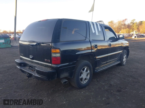 2004 GMC Yukon Denali z VIN 1GKEK63UX4J280662, wystawiony jako IAAI lot #40847473 z przebiegiem 95 677 mil mil oraz . Historia ofert i sprzedaży dostępna na DreamBid. Obrazek 4.