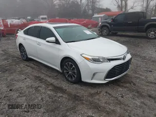 2016 Toyota Avalon Limited with VIN 4T1BK1EB8GU234565, listed as a IAAI auction lot 41804701 with 128,700 mi miles and . Bid and sale history available at DreamBid. Image 1.