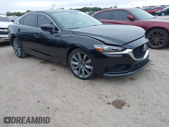 2020 Mazda 6 Touring with VIN JM1GL1VM1L1525879, listed as a IAAI auction lot 41023192 with 43,531 mi miles. Bid and sale history available at carsss.com. Image 1.