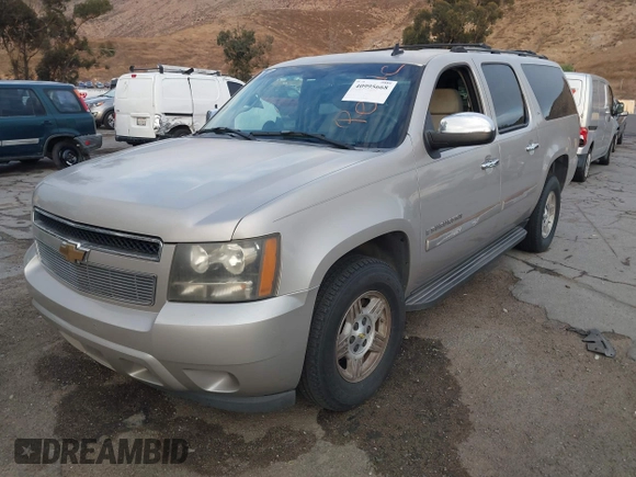 2007 Chevrolet Suburban LT with VIN 1GNFC16007R231427, listed as a IAAI auction lot 40995668 with 168,691 mi miles and . Bid and sale history available at DreamBid. Image 2.