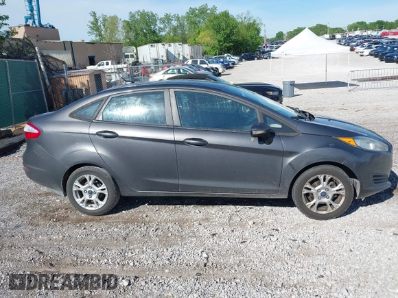 2015 Ford Fiesta SE z VIN 3FADP4BJ7FM158471, wystawiony jako IAAI lot #42090819 z przebiegiem 139 779 mil mil oraz . Historia ofert i sprzedaży dostępna na DreamBid. Obrazek 13.