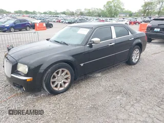 2005 Chrysler 300 with VIN 2C3JA63H05H608145, listed as a IAAI auction lot 42075474 with 167,098 mi miles. Bid and sale history available at carsss.com. Image 2.