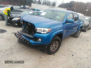 2018 Toyota Tacoma SR5 with VIN 3TMAZ5CN3JM066409, listed as a IAAI auction lot 41204775 with 75,000 mi miles and . Bid and sale history available at DreamBid. Image 17.