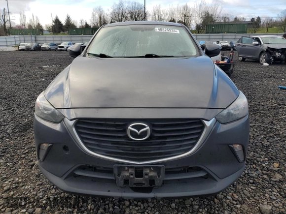 2017 Mazda CX-3 Touring with VIN JM1DKFC74H0176455, listed as a Copart auction lot 48825935 with 90,486 mi miles and Salvage Title. Bid and sale history available at carsss.com. Image 5.