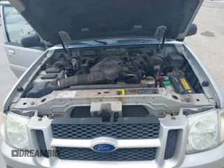 2005 Ford Explorer Sport Trac XLS z VIN 1FMZU77K15UB67801, wystawiony jako IAAI lot #42822163 z przebiegiem 179 102 mil mil oraz . Historia ofert i sprzedaży dostępna na DreamBid. Obrazek 10.